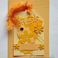 Cheery Yellow Tag Greeting Card with Flowers