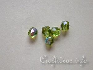 Faceted Round Shaped Glass Beads