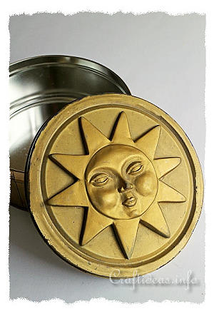 Recycling Craft for Summer - Gold Cookie Tin with Plaster of Paris Sunshine Motif