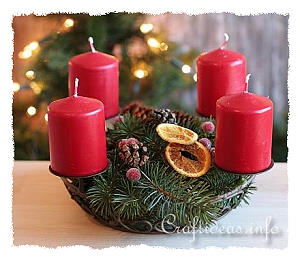 Christmas Centerpiece with Red Candles and Decorations 