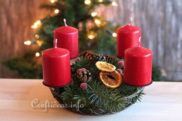Christmas Centerpiece with Red Candles and Decorations